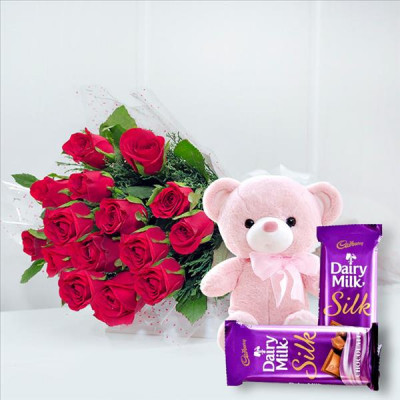 Roses , Cadbury Chocolates and Teddy Bear
