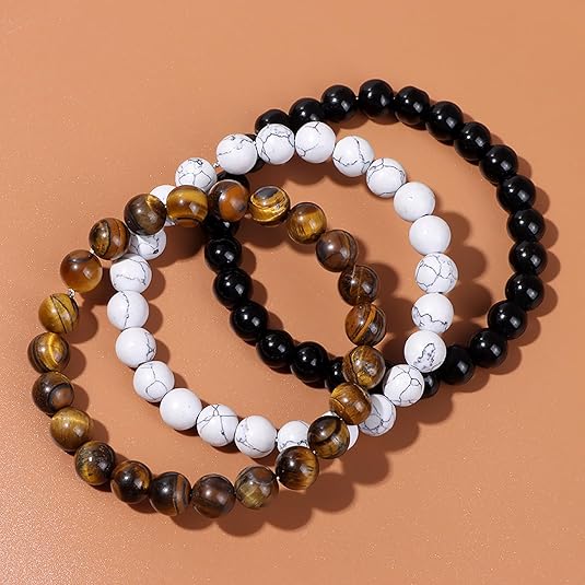 exquisitely crafted bracelet, showcasing the natural beauty of Tiger Eye, Obsidian, and Turquoise.