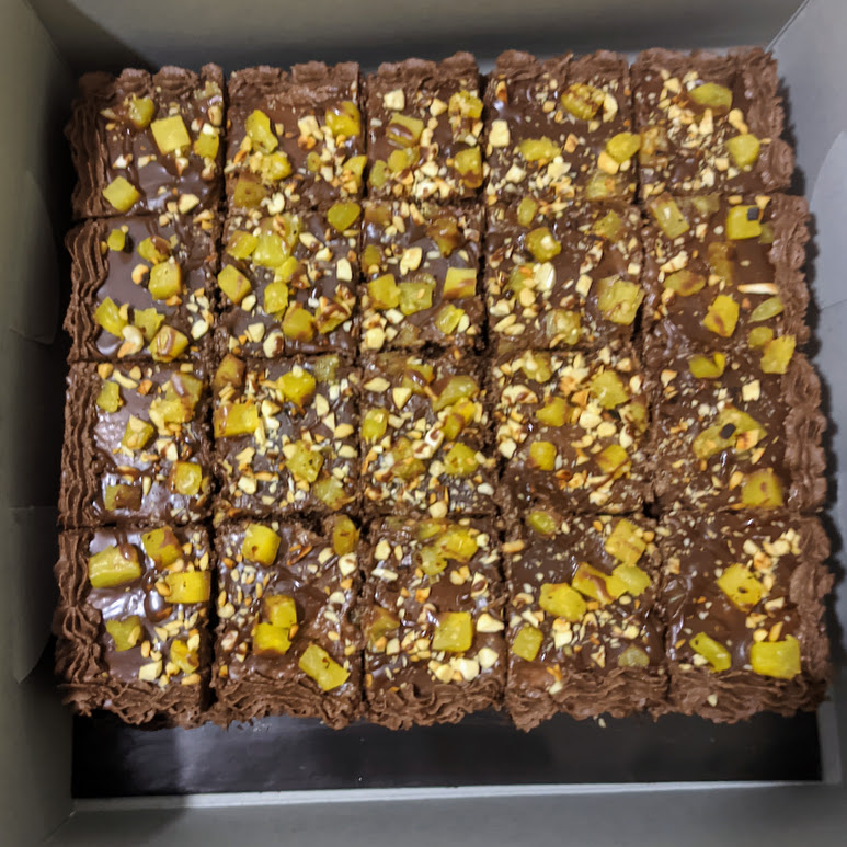 Each slice begins with a moist, rich chocolate sponge, baked to perfection