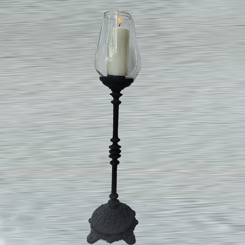 This beautiful piece is designed to showcase the warm, inviting glow of your favorite candles while providing a protective, wind-resistant glass chimney